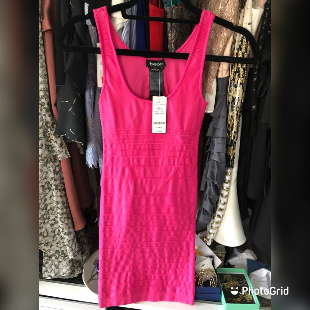 Bebe. Bright pink bodycon dress.